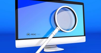 Imagen conceptual de una lupa sobre una pantalla de ordenador, representando la búsqueda de archivos en un sistema Windows.